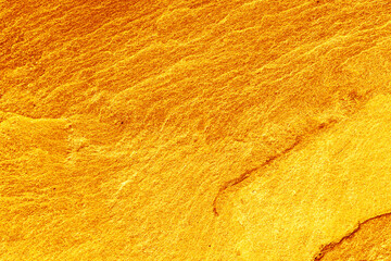 Gold stone texture for background.