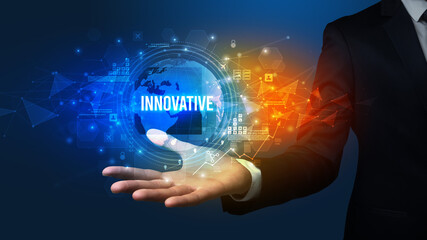 Elegant hand holding INNOVATIVE inscription, digital technology concept