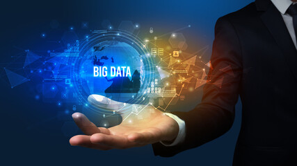 Elegant hand holding BIG DATA inscription, digital technology concept