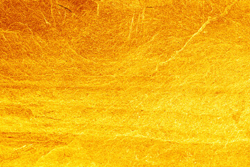 Gold stone texture for background. gold background