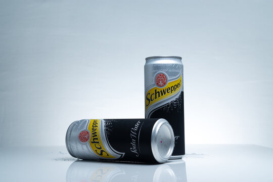 Kuala Lumpur, Malaysia - November 25, 2017 : Photo Of Schweppes with micro dew On White Background. The Dr Pepper Snapple Group is the current owner of the Schweppes trademark.