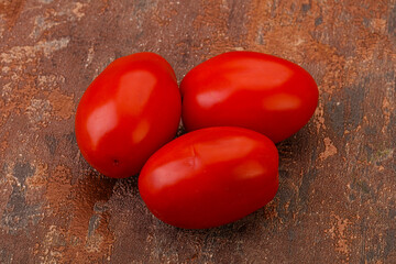 Red bright tasty tomato heap