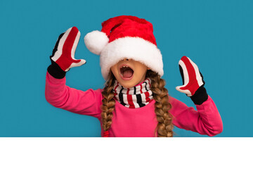 The Christmas hat closed the little girl's eyes.