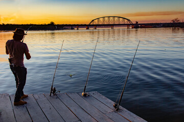 Fishing on the Madeira River at Sunset