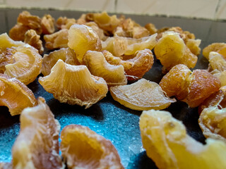Picture of homemade dipped and dyed in sugar syrup gooseberry candy