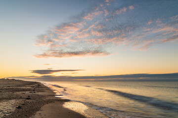Fototapeta na wymiar Stunning colorful sunrise over beach landscape on English South coast