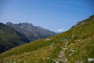 Stony hiking trail far above the tree line in the Austrian Alps