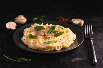 Italian pasta with creamy sauce and mushrooms
