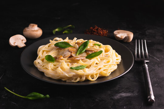 Italian Pasta With Creamy Sauce And Mushrooms