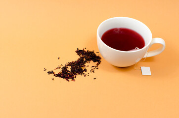 Cup with tea on the table