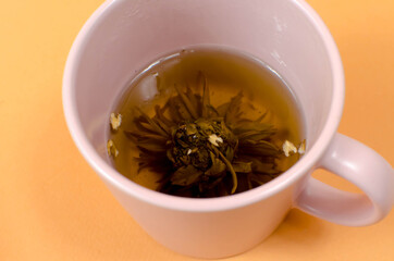 Cup with tea on the table