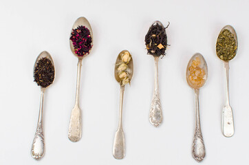 spoon with tea on the table