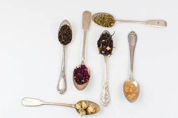 spoon with tea on the table