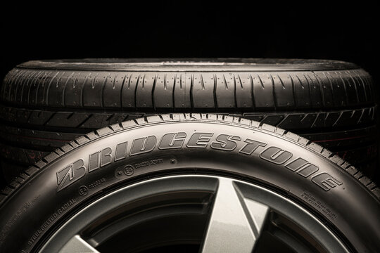 Krasnoyarsk, Russia, February 12, 2020: Bridgestone Tires, close-up logo on the sidewall, black Fn, and a beautiful flare.