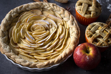 Homemade apple pie top view photo. Delicious apple tart or pie on a table. Autumn menu ideas. Healthy eating concept.  
