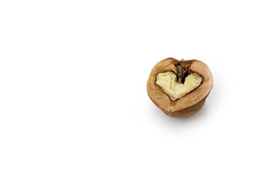 walnut in a heart isolated on white background.