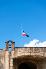 view of the Dominican flag at half mast, for national mourning