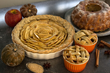 Homemade apple pie top view photo. Delicious apple tart or pie on a table. Autumn menu ideas. Healthy eating concept.  
