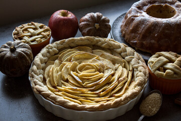 Homemade apple pie top view photo. Delicious apple tart or pie on a table. Autumn menu ideas. Healthy eating concept.  

