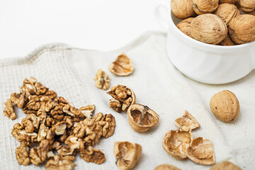 walnuts on a white wooden background