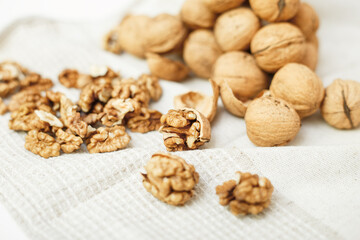 walnuts on a white wooden background