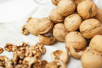 walnuts on a white wooden background