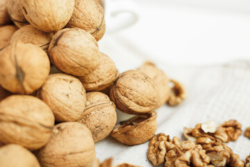 walnuts on a white wooden background