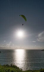 Paraglider extreme sports in summer day phuket thailand.