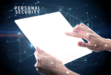Holding futuristic tablet with PERSONAL SECURITY inscription, cyber security concept
