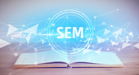 Open book with SEM abbreviation, modern technology concept