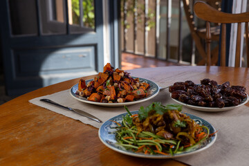 sautéed sweet potato dish with vegetables and chickpeas