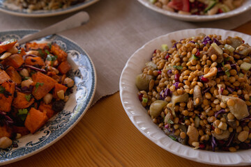 healthy food dishes with white beans, lentils, sweet potatoes, rice and vegetables