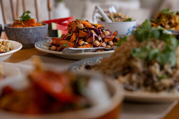 sautéed sweet potato dish with vegetables and chickpeas
