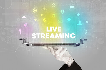 Waiter serving social networking with LIVE STREAMING inscription, new media concept