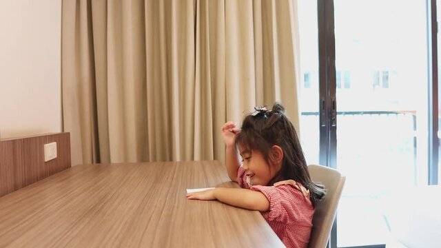 Cute Little Girl Is Drawing Picture
