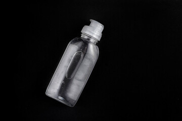 Bottle with antiseptic gel with blue background
