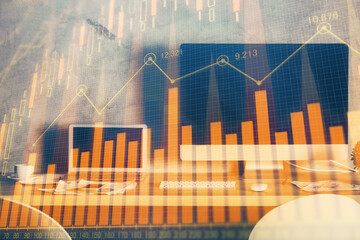 Multi exposure of forex graph and work space with computer. Concept of international online trading.