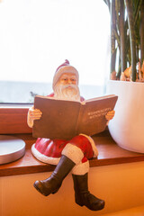 Santa Claus reads fairy tales to children