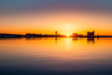 Fototapeta na wymiar Gorgeous sunrise at the Boston Waterfront Harbour