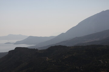 Fototapeta premium Sunset over the beautiful beaches of the Greek island of Samos in the Aegean Sea, Greece
