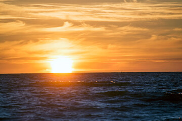 Obraz premium Sunset on the Baltic sea. Water area of the port of Klaipeda, Lithuania.
