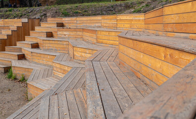 Summer stage, for spectators seat wooden staircase