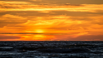 Sunset on the Baltic sea. Water area of the port of Klaipeda, Lithuania.