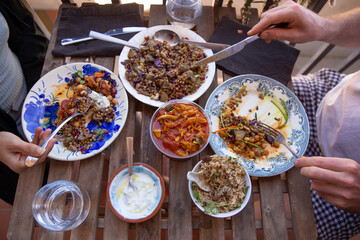 Hands having dinner eating  health food 