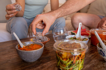 hands touching healthy food from a delivery takeaway 