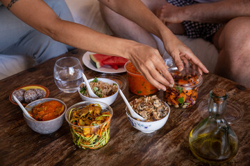 hands touching healthy food from a delivery takeaway 