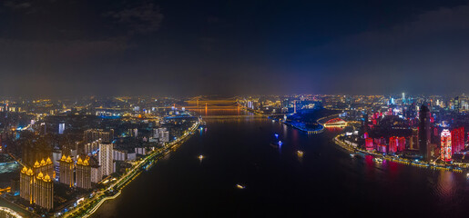 wuhan light show.Panoramic skyline and buildings beside yangtze river of Wuhan china
