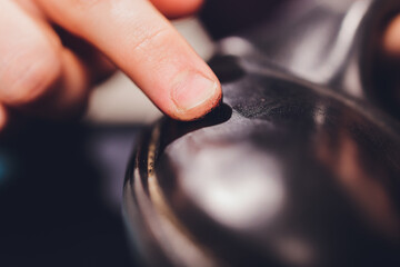Brushes, wax, boots. applying cream with your finger. Shoe repair.