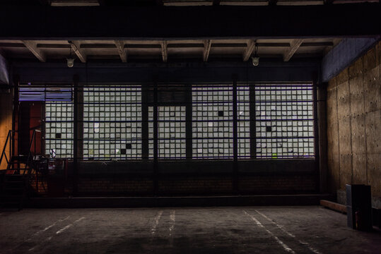 abandoned warehouse with light coming through windows