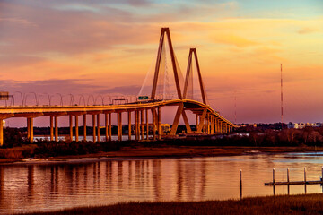Fototapeta na wymiar Reflection of Arthur Ravenel Bridge at Sunset in Charleston South Carolina